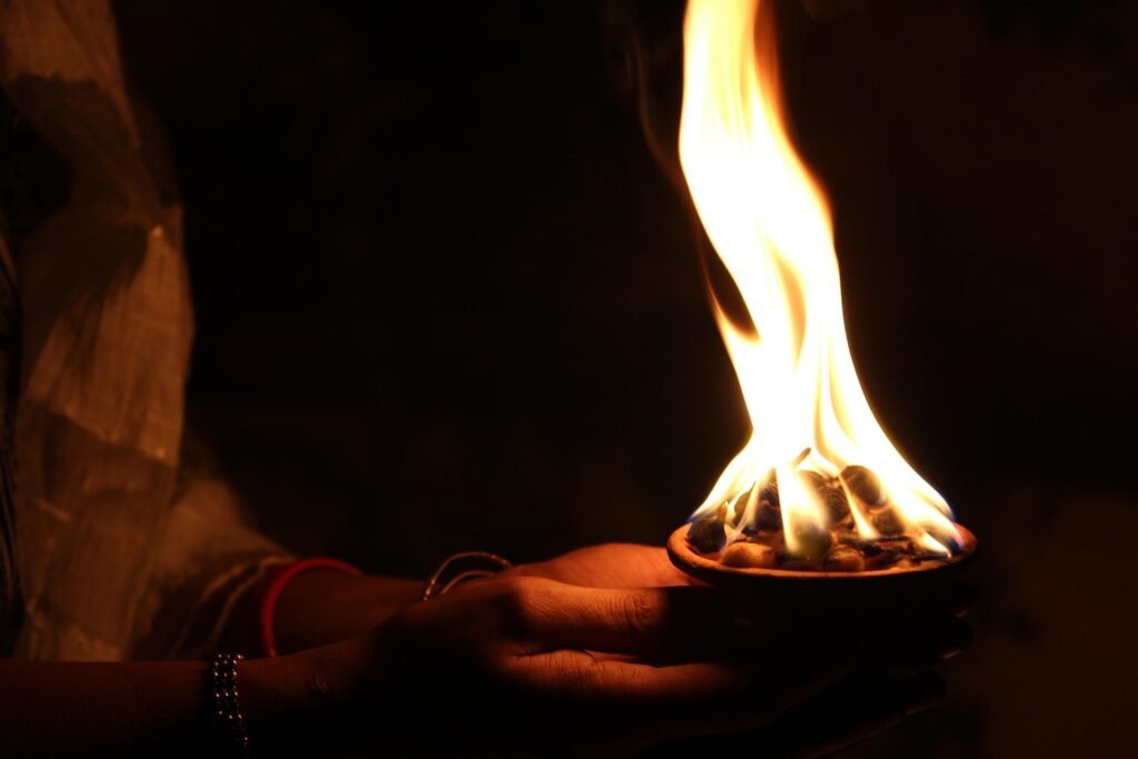 Close-up of fire used in a traditional Vishnumaya Kuttichathan ritual