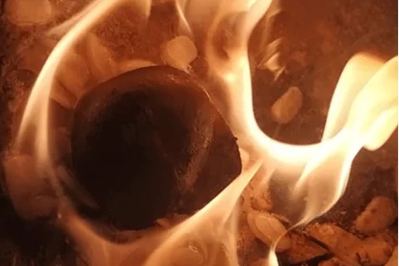Protective fire ritual symbolizing spiritual cleansing and black magic protection